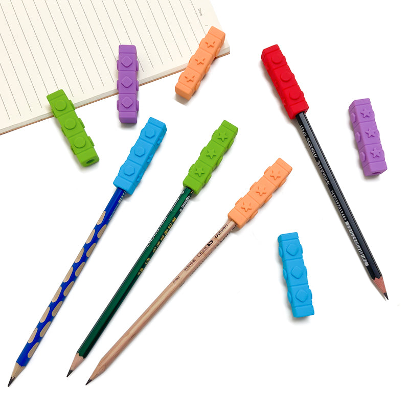Cube-shaped pen topper providing tactile and oral feedback