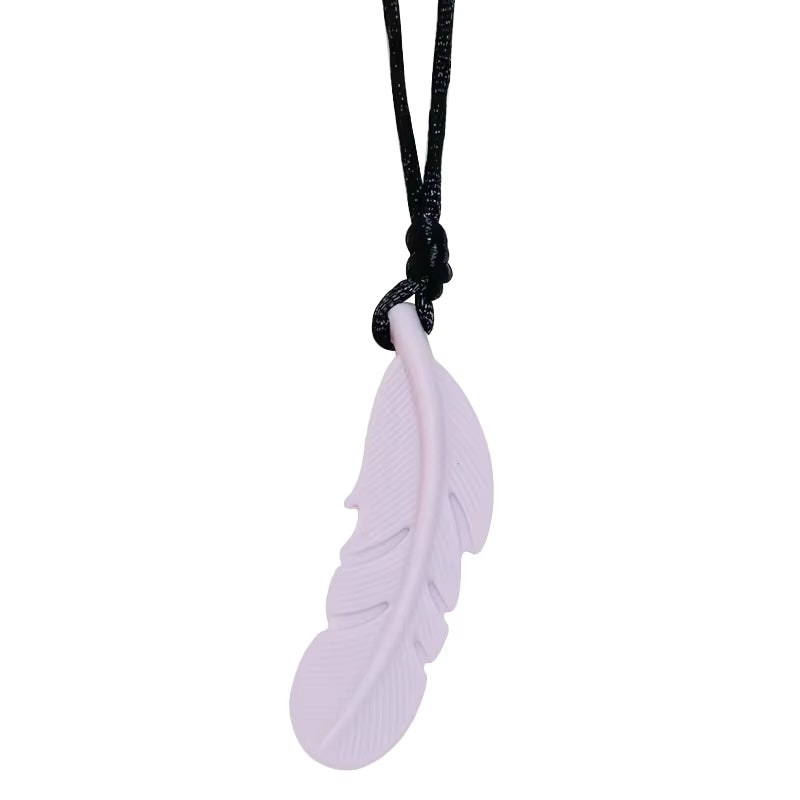 Close-up of feather chew necklace design
