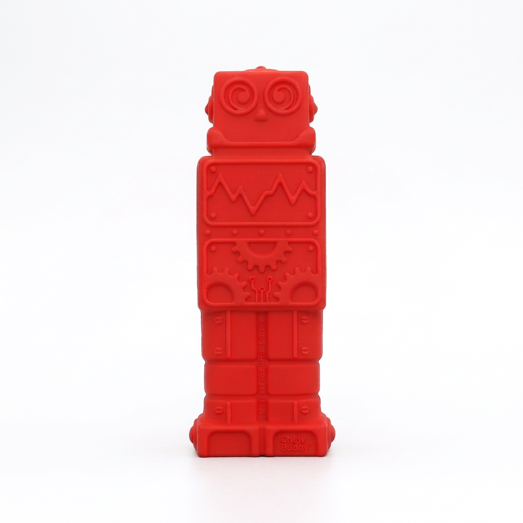 A red robot-shaped silicone synaptoys pen topper with embossed details, standing upright on a light gray background.