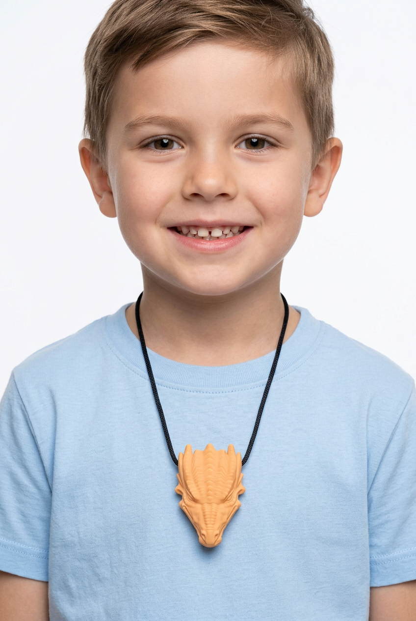 Close-up of dragon chew necklace worn by boy in dubai
